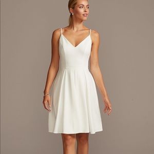 Spaghetti strap stretch crepe fit and flare dress with pockets
